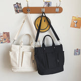 Sac à bandoulière en toile sobre de grande capacité