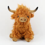 Vache des hautes terres portant des fleurs