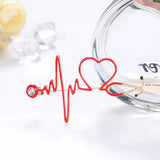 Mini broche stéthoscope coeur d'amour