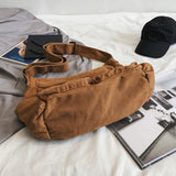 Sac messager en toile de couleur unie