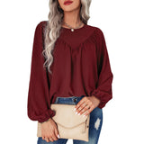 Chemisier uni à manches bouffantes et encolure ronde