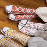 Chaussures et bas drôles en toile réelle et fausse