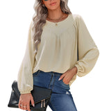 Chemisier uni à manches bouffantes et encolure ronde