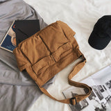 Sac messager en toile de couleur unie