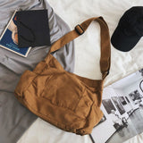 Sac messager en toile de couleur unie