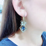 Boucles d'Oreilles Fleur Zircon Rhombique Saphir