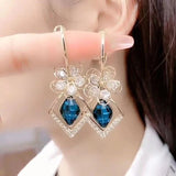 Boucles d'Oreilles Fleur Zircon Rhombique Saphir