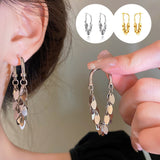 Boucles d'oreilles pompons à sequins