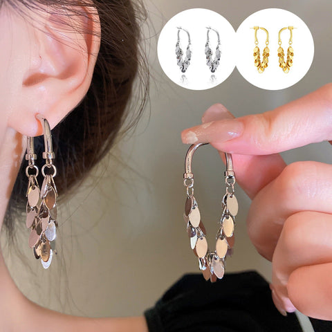 Boucles d'oreilles pompons à sequins