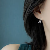 Boucles d'oreilles petits pompons de poisson