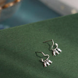 Boucles d'oreilles petits pompons de poisson