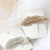 Barrette à plumes de diamant