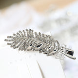 Barrette à plumes de diamant