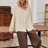 Chemise ample à boutonnage simple