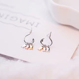 Boucles d'oreilles petits pompons de poisson