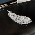 Barrette à plumes de diamant