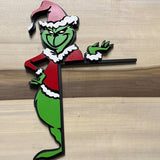 Coin de porte de Noël du Grinch