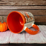 Tasse à café citrouille avec fantôme