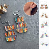 Boucles d'oreilles chat avec livres