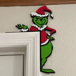 Coin de porte de Noël du Grinch