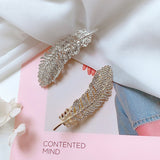 Barrette à plumes de diamant