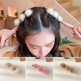 Clip de Bec de Canard en Boule de Poils