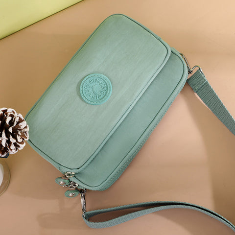 Sac à bandoulière multi-poches fonctionnel