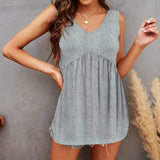 Gilet d'été en dentelle avec un décolleté en V