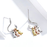 Boucles d'oreilles petits pompons de poisson