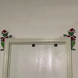 Coin de porte de Noël du Grinch