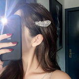 Barrette à plumes de diamant