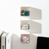 Boîte de rangement transparente anti-poussière fixée au mur