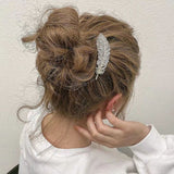 Barrette à plumes de diamant