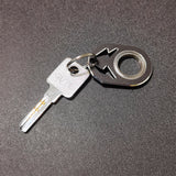 Porte-clés motif éclair rotatif