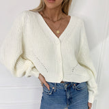 Pull en Tricot Boutonné à Manches Bouffantes et Col en V de Couleur Unie