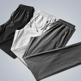 Pantalon de survêtement élastique à séchage rapide