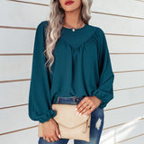 Chemisier uni à manches bouffantes et encolure ronde