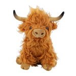 Vache des hautes terres portant des fleurs