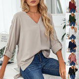 Chemise élégante ample à col en V