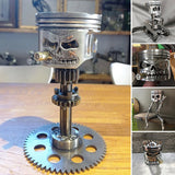 Sculpture de visage de crâne de piston