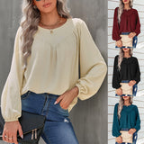 Chemisier uni à manches bouffantes et encolure ronde