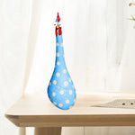 Décoration de poulet avec un long cou et de grands yeux