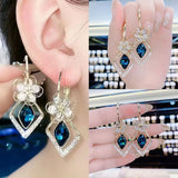 Boucles d'Oreilles Fleur Zircon Rhombique Saphir