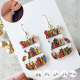 Boucles d'oreilles chat avec livres