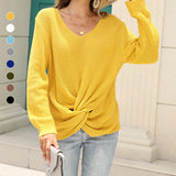 Pull en tricot noué