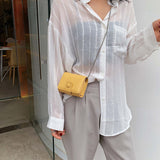 Mini sac à cosmétiques à bandoulière