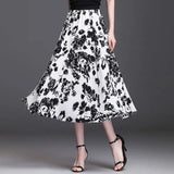 Jupe trapèze mi-longue coupe ajustée élastique simple