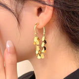 Boucles d'oreilles pompons à sequins