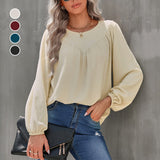 Chemisier uni à manches bouffantes et encolure ronde