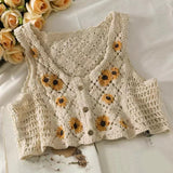 Gilet en tricot à marguerites